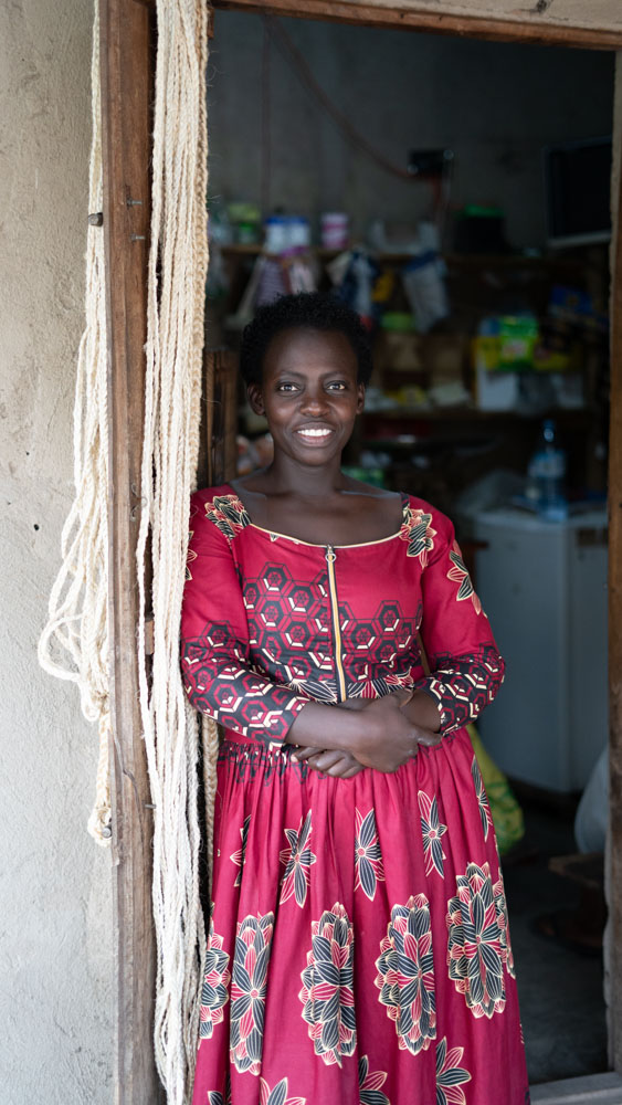 A woman standing in a doorway.